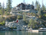 Walkway and boulder retaining walls down to lake