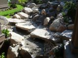 Stone bridge walkway over streambed