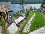 Stone lattice drive path with boulder edging