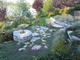 Side view of flagstone and fire pit in setting sun