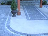 Pavers inset into concrete border