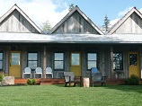 Bungalow porch down to lawn with outdoor seating