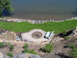 Top view of fire pit, hillside and sand play area