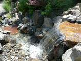 Flat rock waterfall chosen for the water launch effect