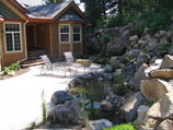 Paver patio with water feature and serenity pool
