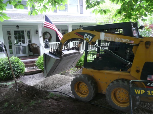 Rent the skid steer.  You're welcome.