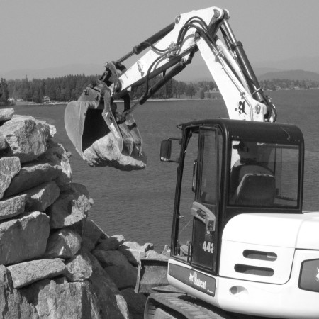 Start your retaining wall on solid footing.