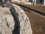 Natural, small rock border wall