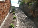 Stone edging framing a rock path