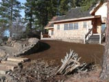 Curved stone stairway with native stone farm/field wall