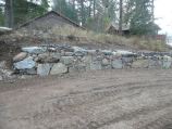 Mixed stone, native and imported, retaining wall