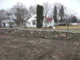 Mixed stone, rock and boulder stacked wall