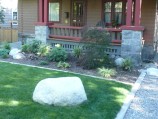 Granite boulder in lawn