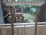 Cedar gate in cedar fence in Japanese garden style