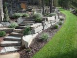Stone steps, retaining wall and lawn