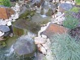 Multiple tier waterfall with collection ponds