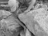 Finding the perfect spot to place rock in a retaining wall for stability and asthetics